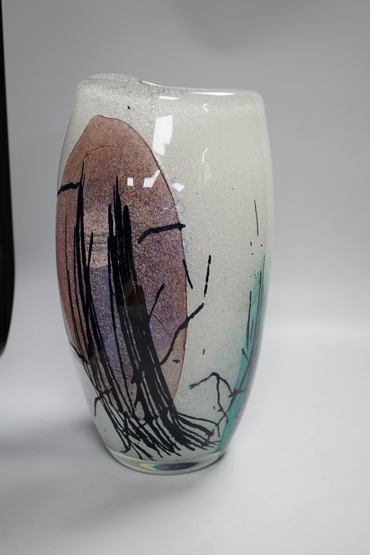 Four studio glass vases, to include Kaj Franck (1911-1989), for Nuutajärvi Notsj, a mid century blue conical glass vase an interesting multi coloured abstract bubble suffused vase- 36cms high